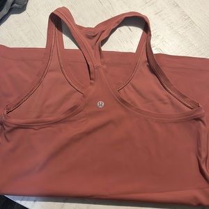 Lululemon align tank size 10. Rose color. Tags removed. Excellent condition.